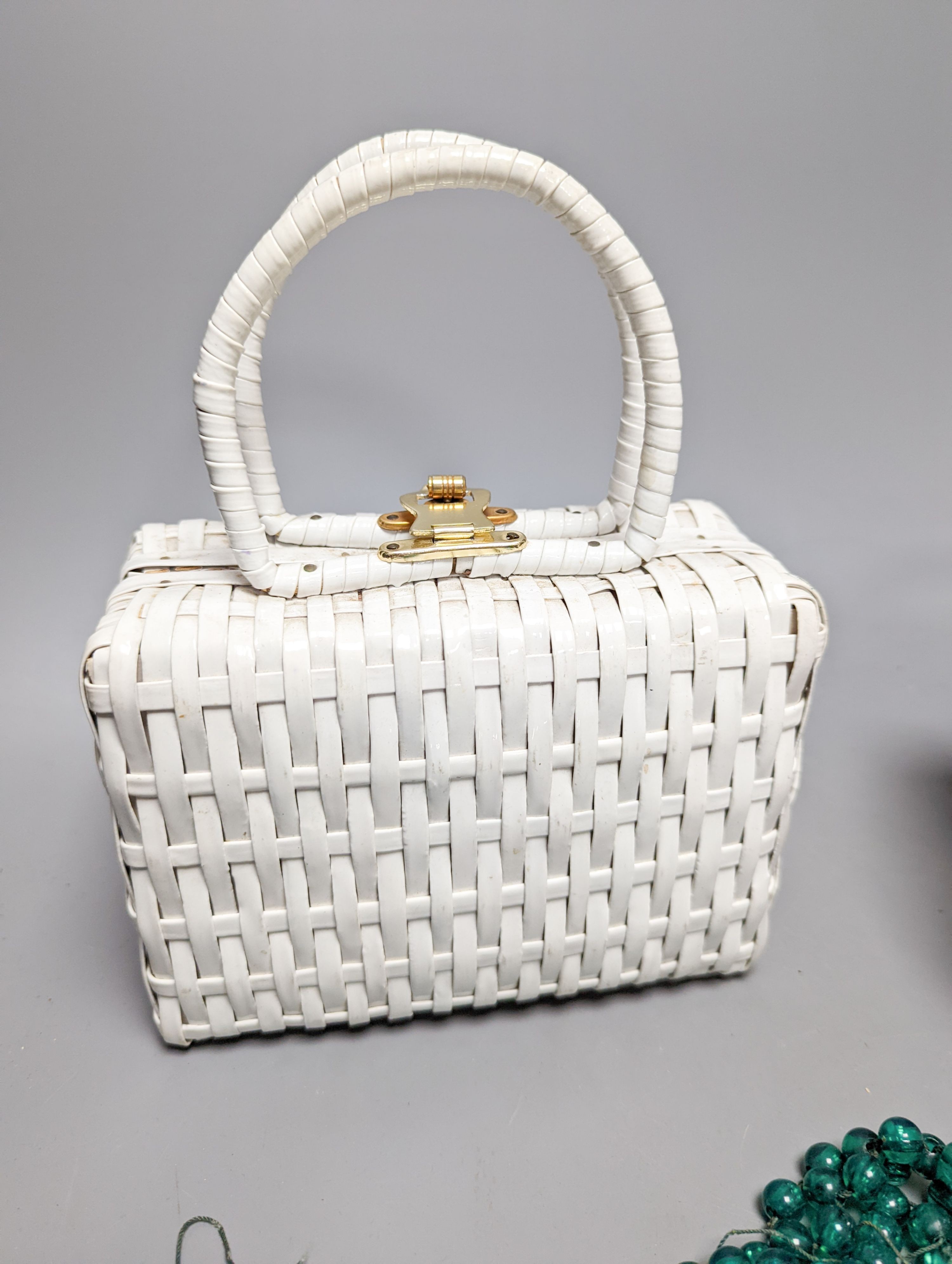 Two American 1950's-60's novelty handbags and three beaded evening bags